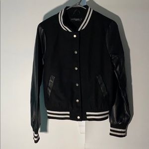 Black and white jacket with fake leather sleeves